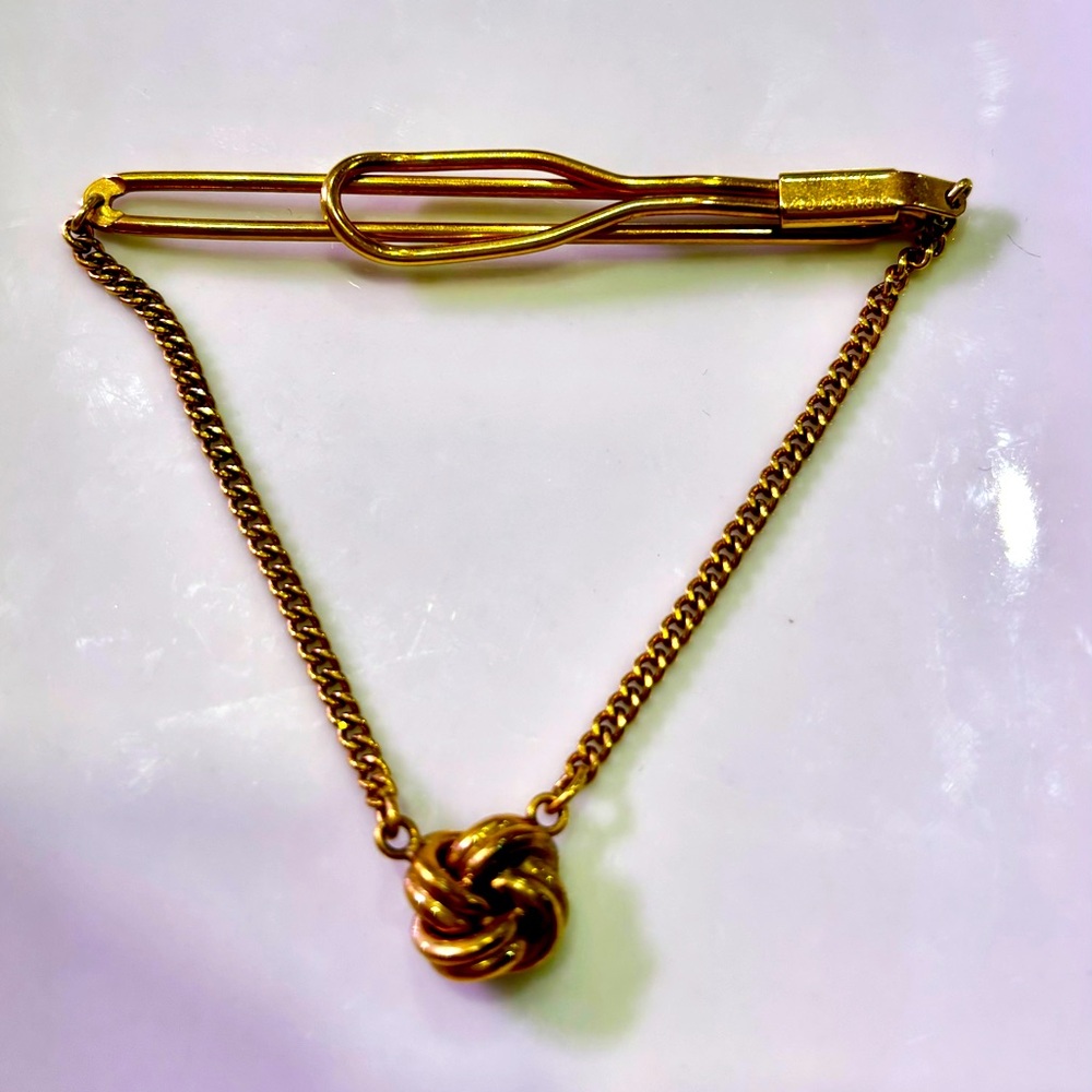 Vintage Goldtone “Swank” Tie Clip with Hanging Chains and Love Knot Pendant